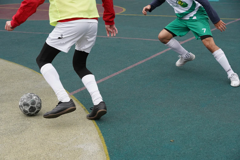 a group of people playing football