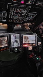 a control panel with many buttons and knobs