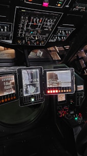 a control panel with many buttons and knobs