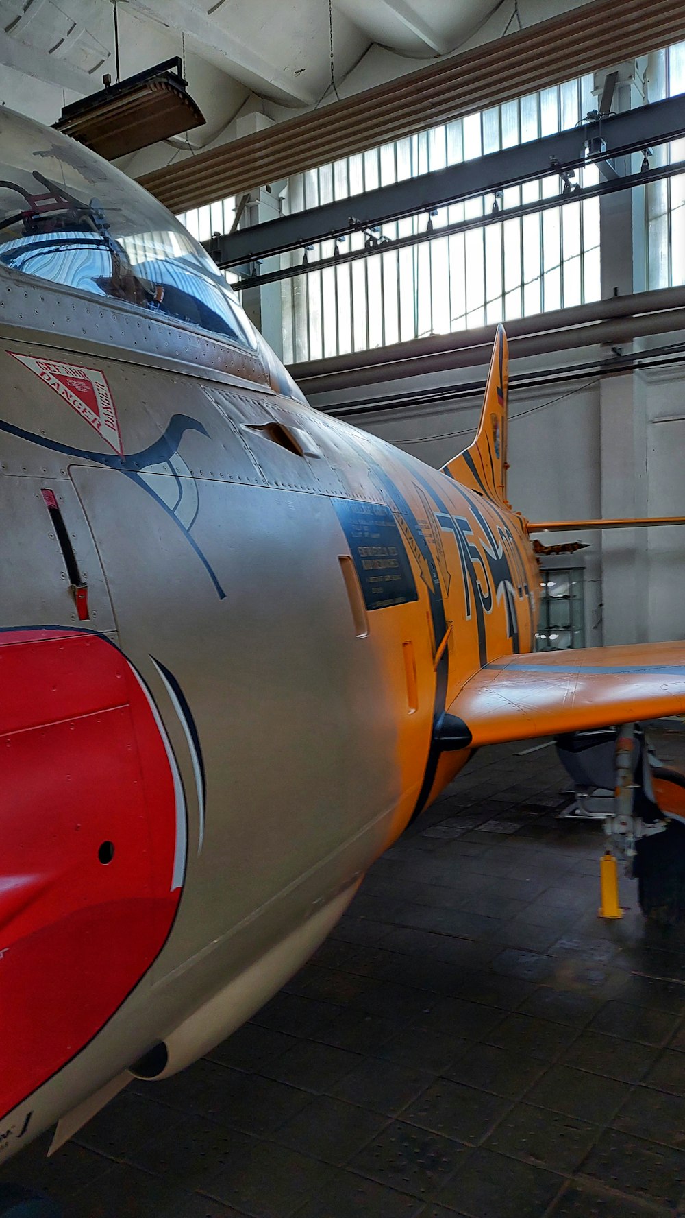 a large airplane in a hangar