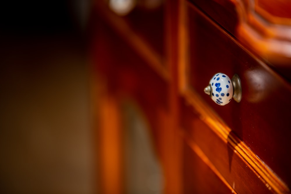 a close up of a ring on a wooden surface