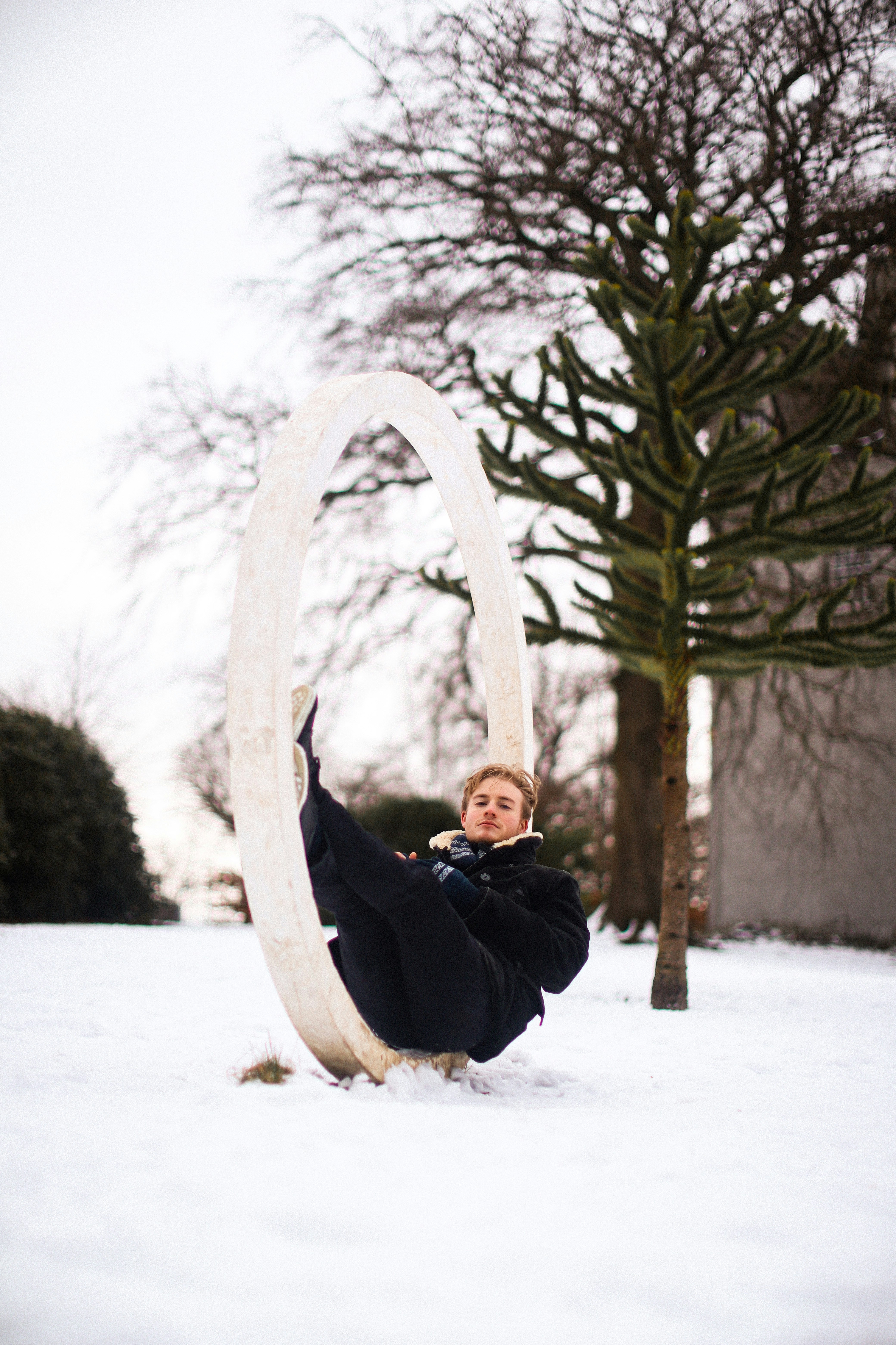 a person sitting in the snow