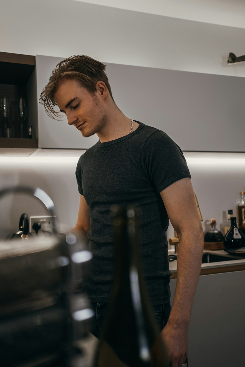 a man in a kitchen