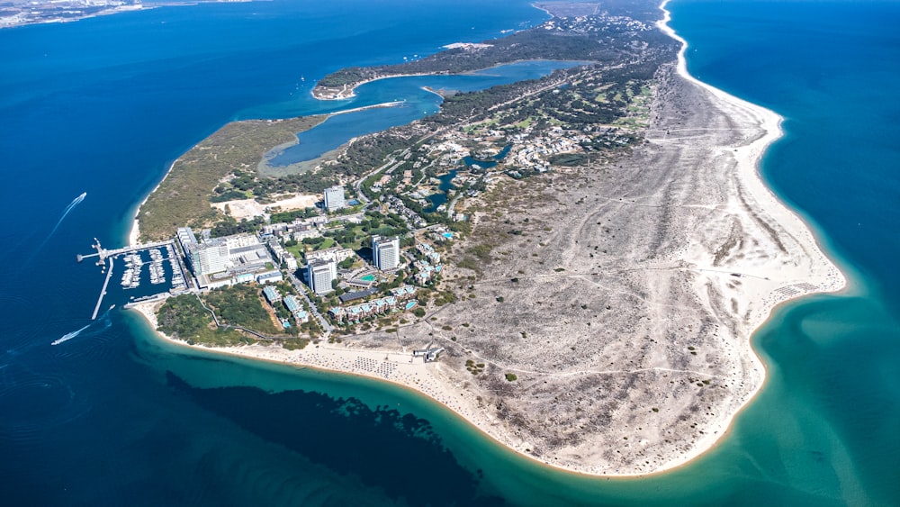 an aerial view of a beach and ocean