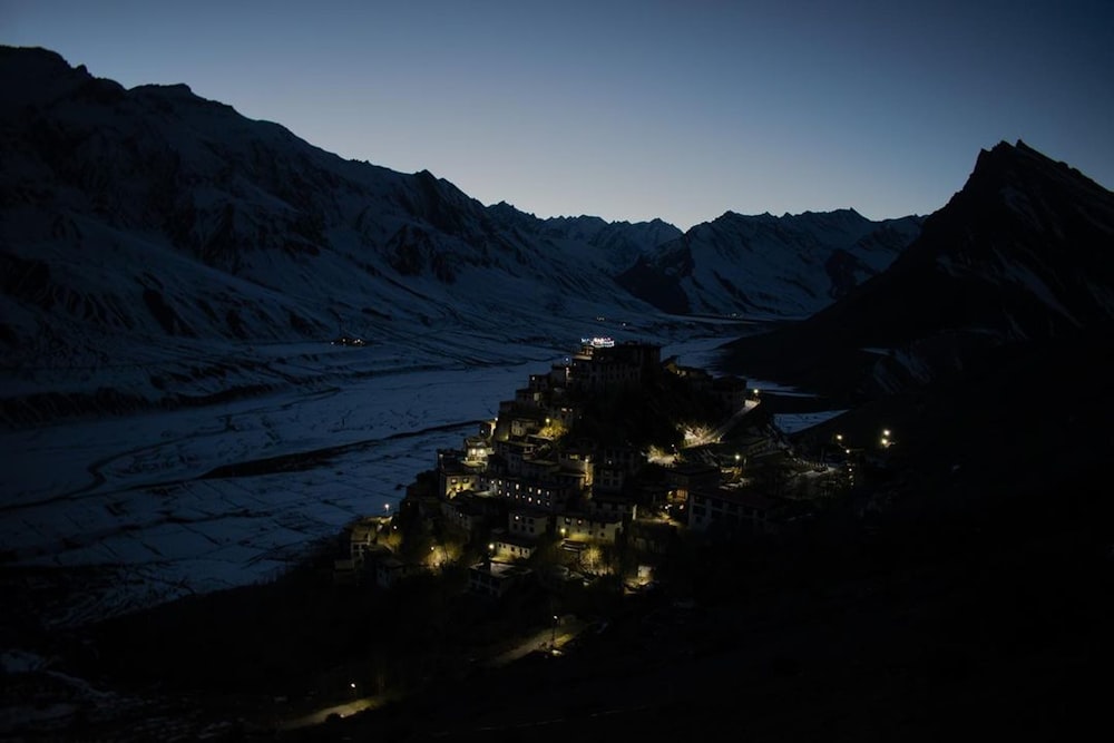 a large building in the mountains