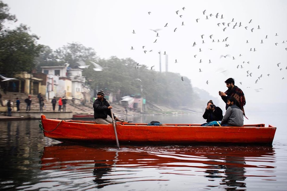 a group of people in a boat