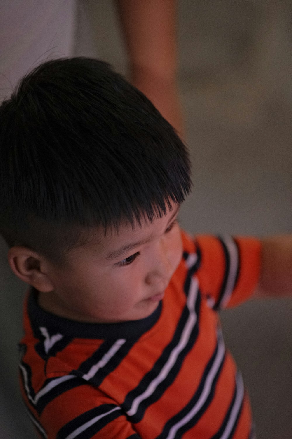 a boy looking down