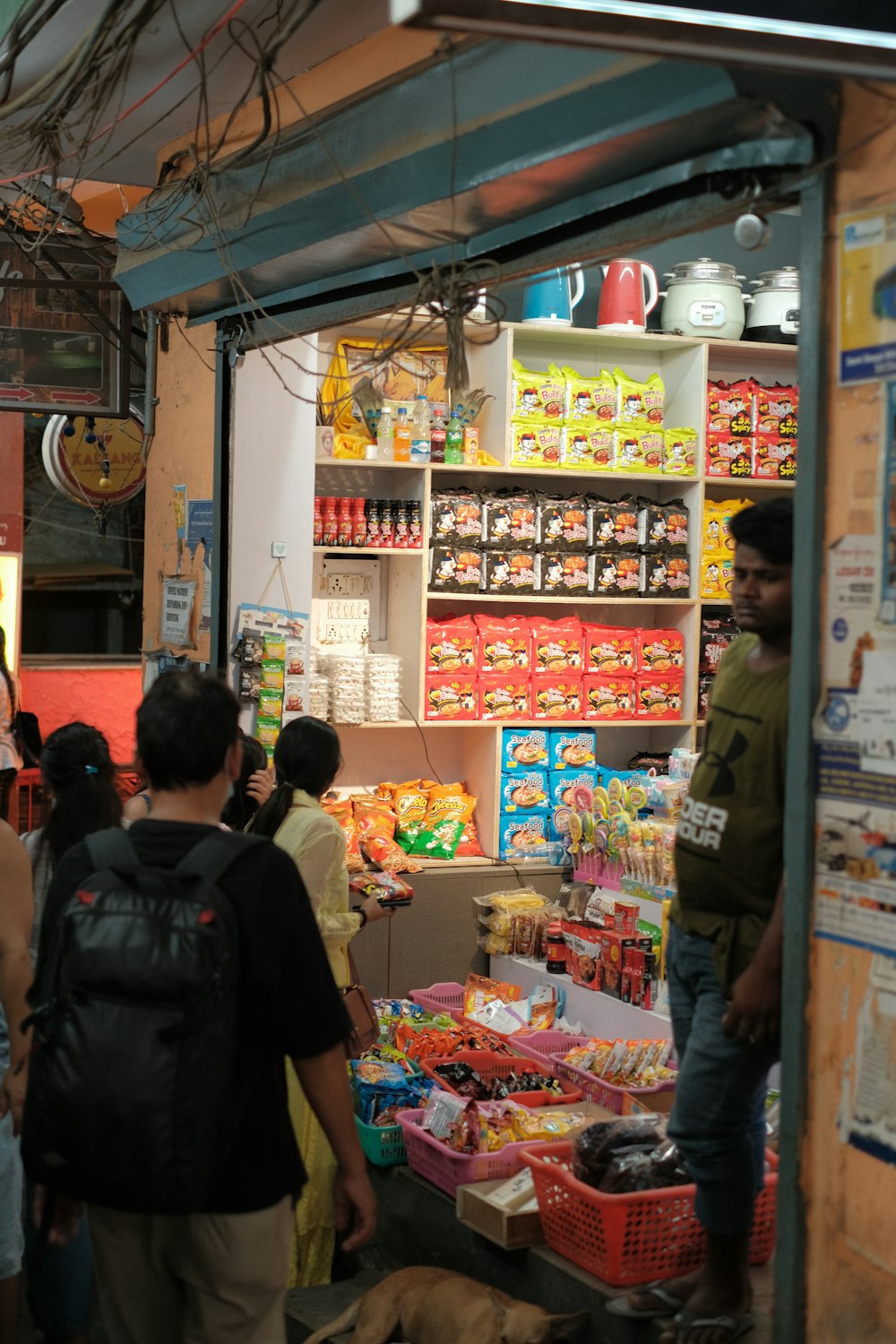 people standing in a market