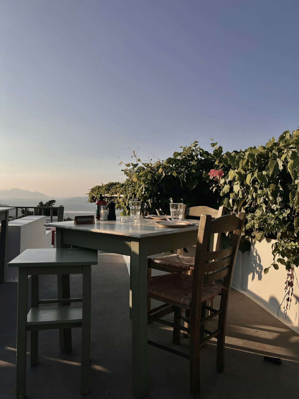 a table and chairs on a deck