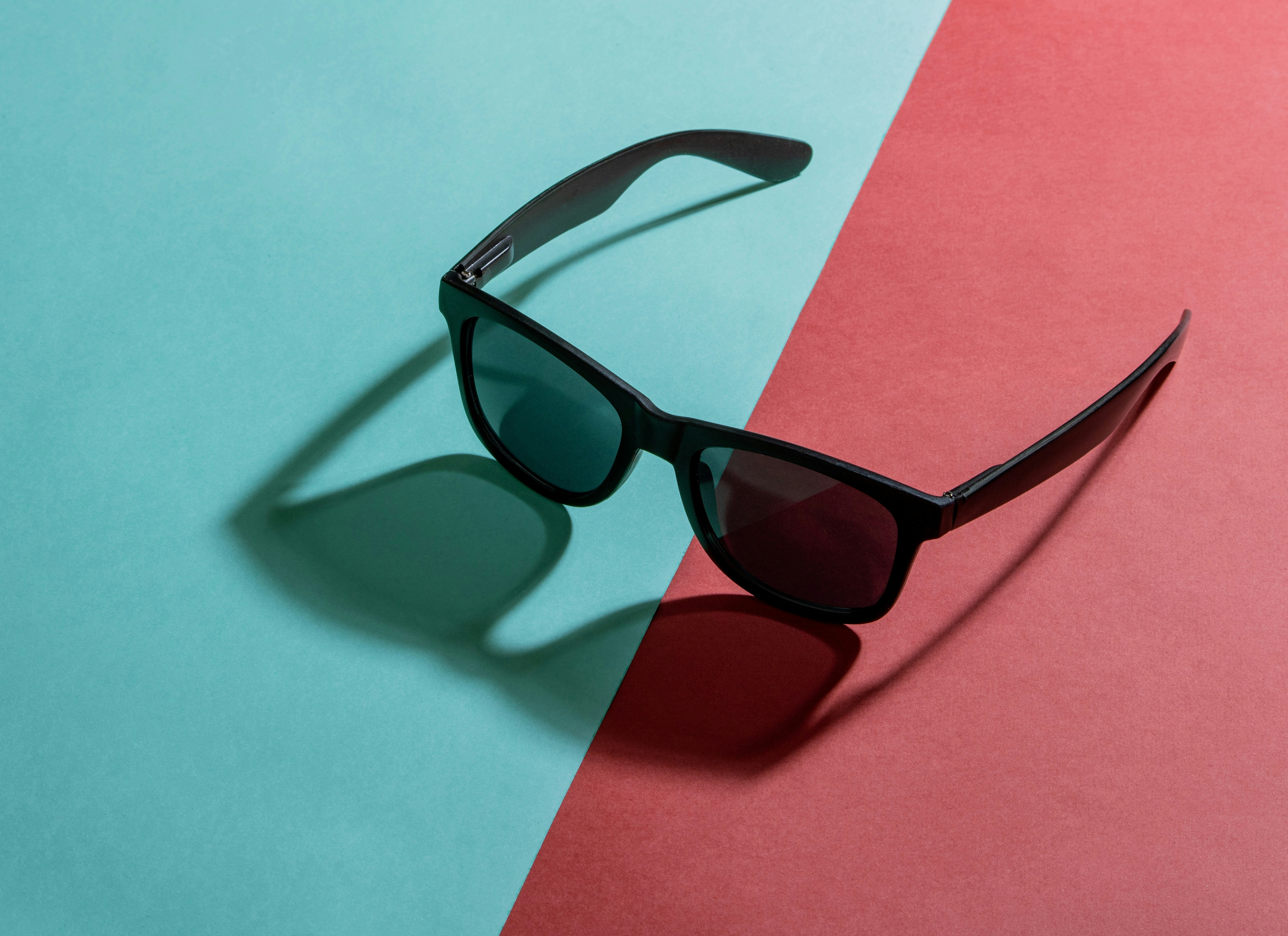 a pair of black sunglasses