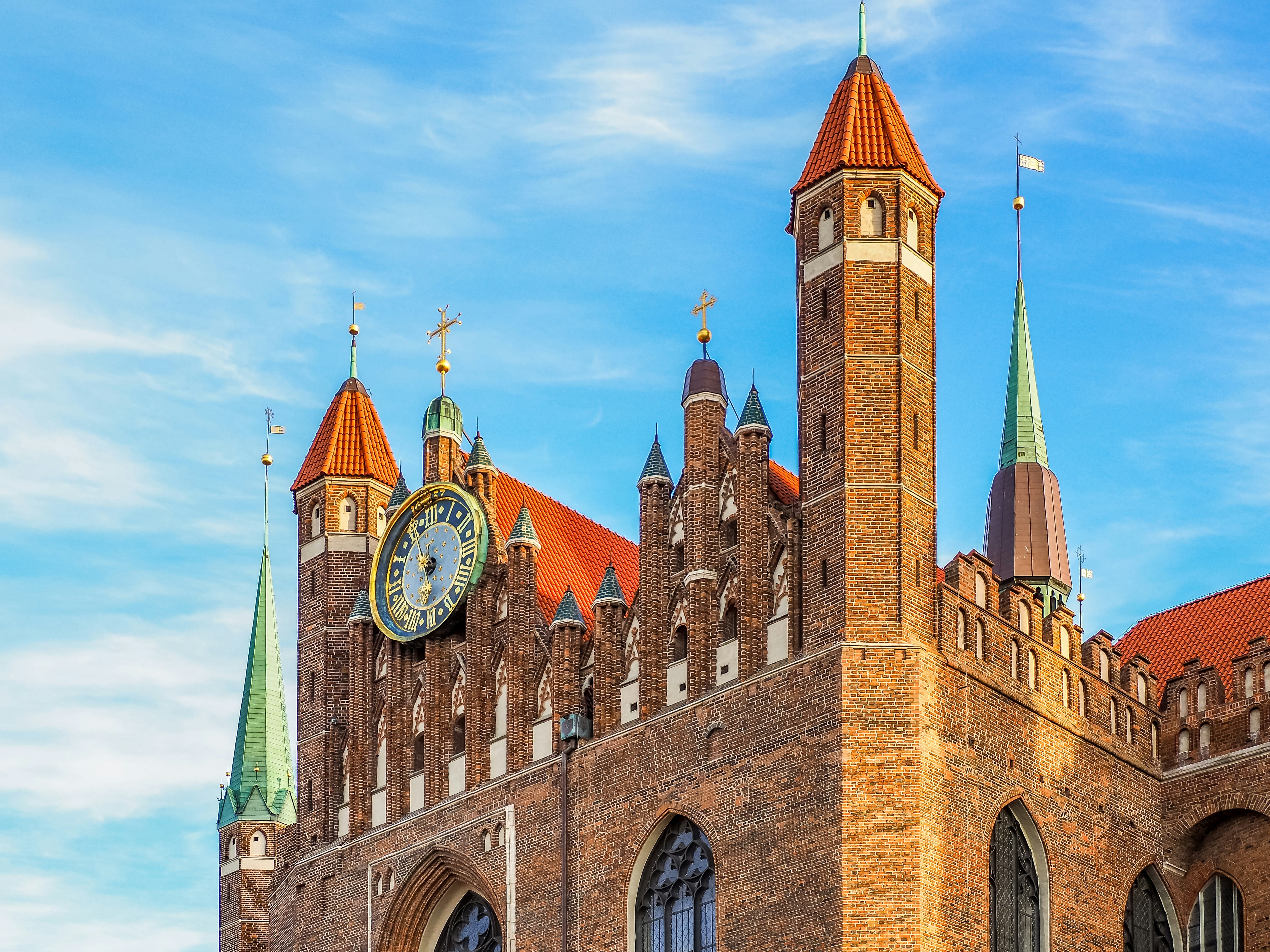 a large building with a clock on it, 