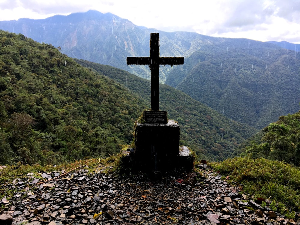 a cross on a hill