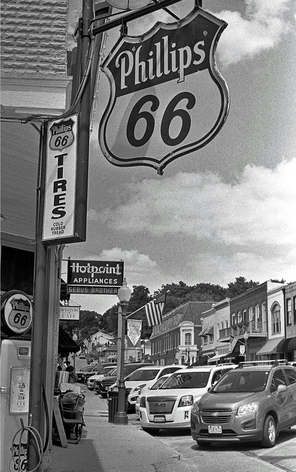 a sign hangs from a pole