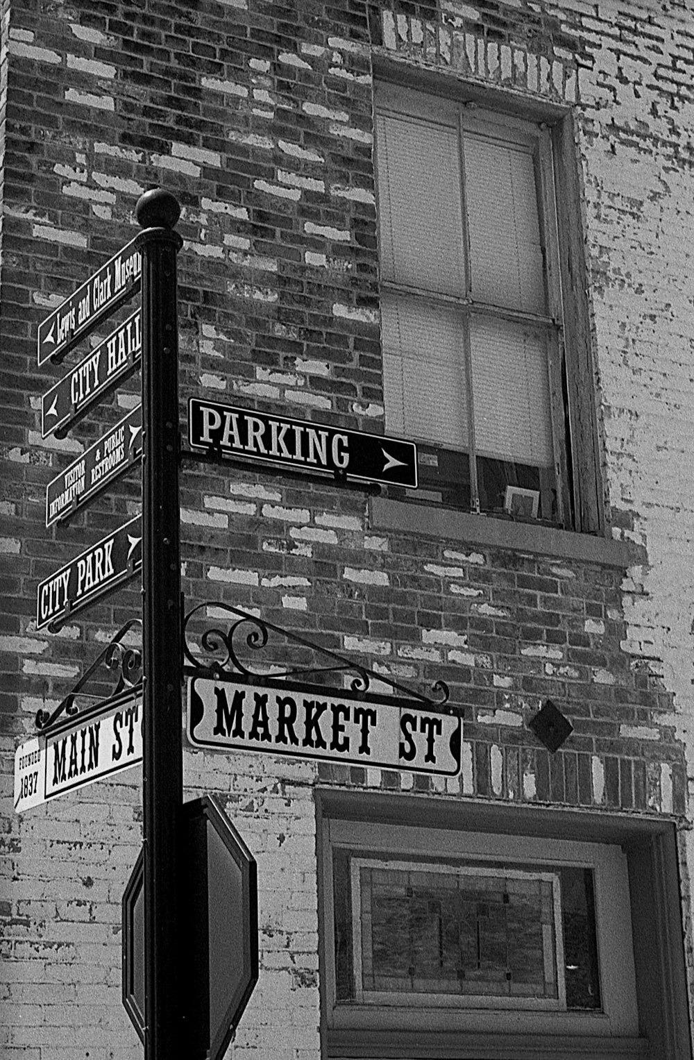 a street sign is posted on a pole