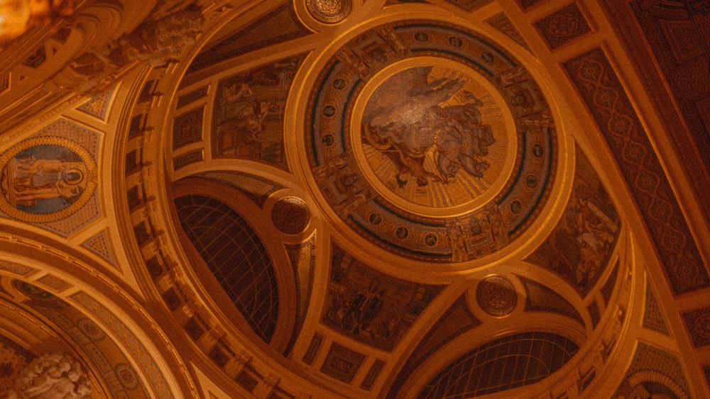 a ceiling with paintings on it