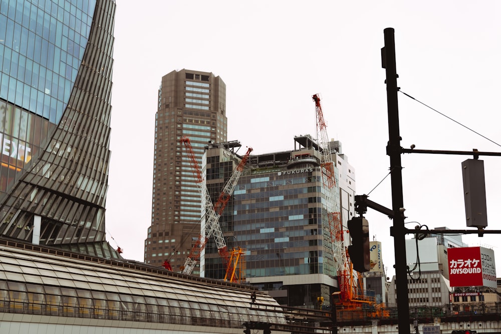 a construction site with cranes