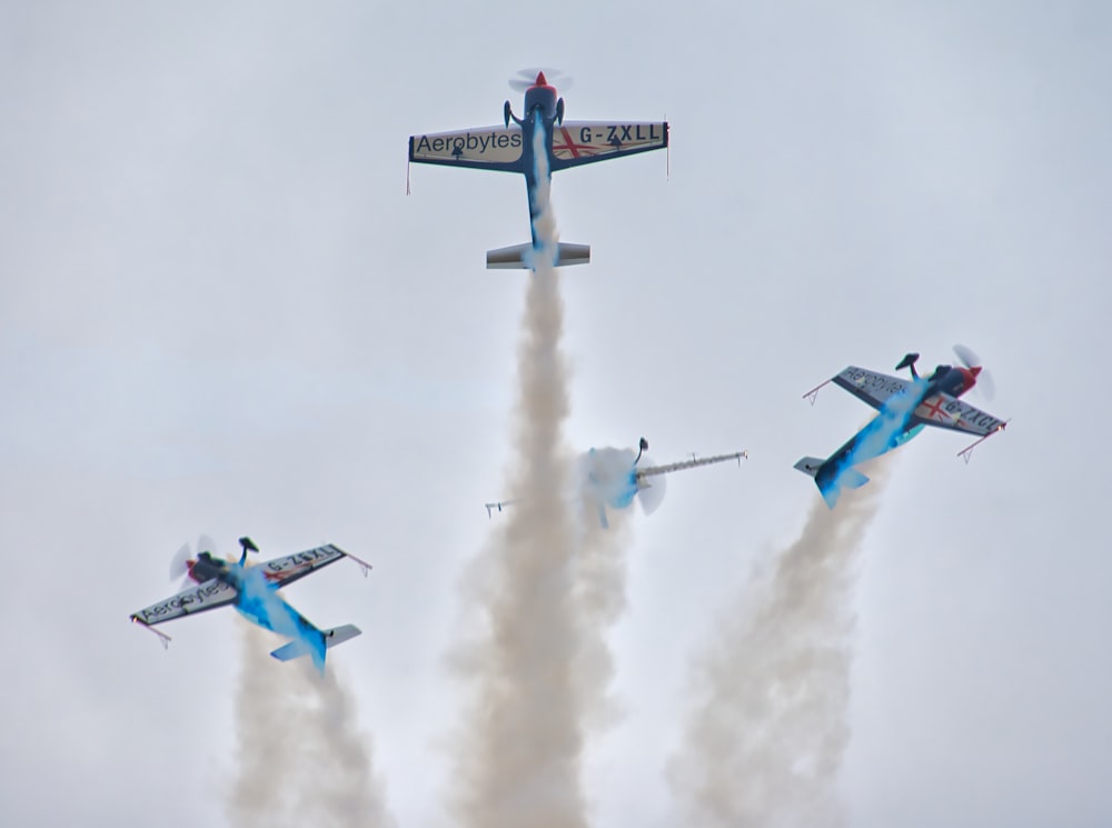 a group of airplanes flying in the sky