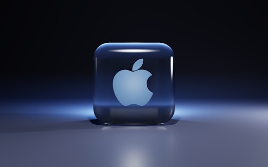 a blue glass with a white logo