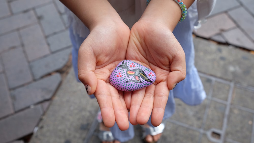 a person holding a ball