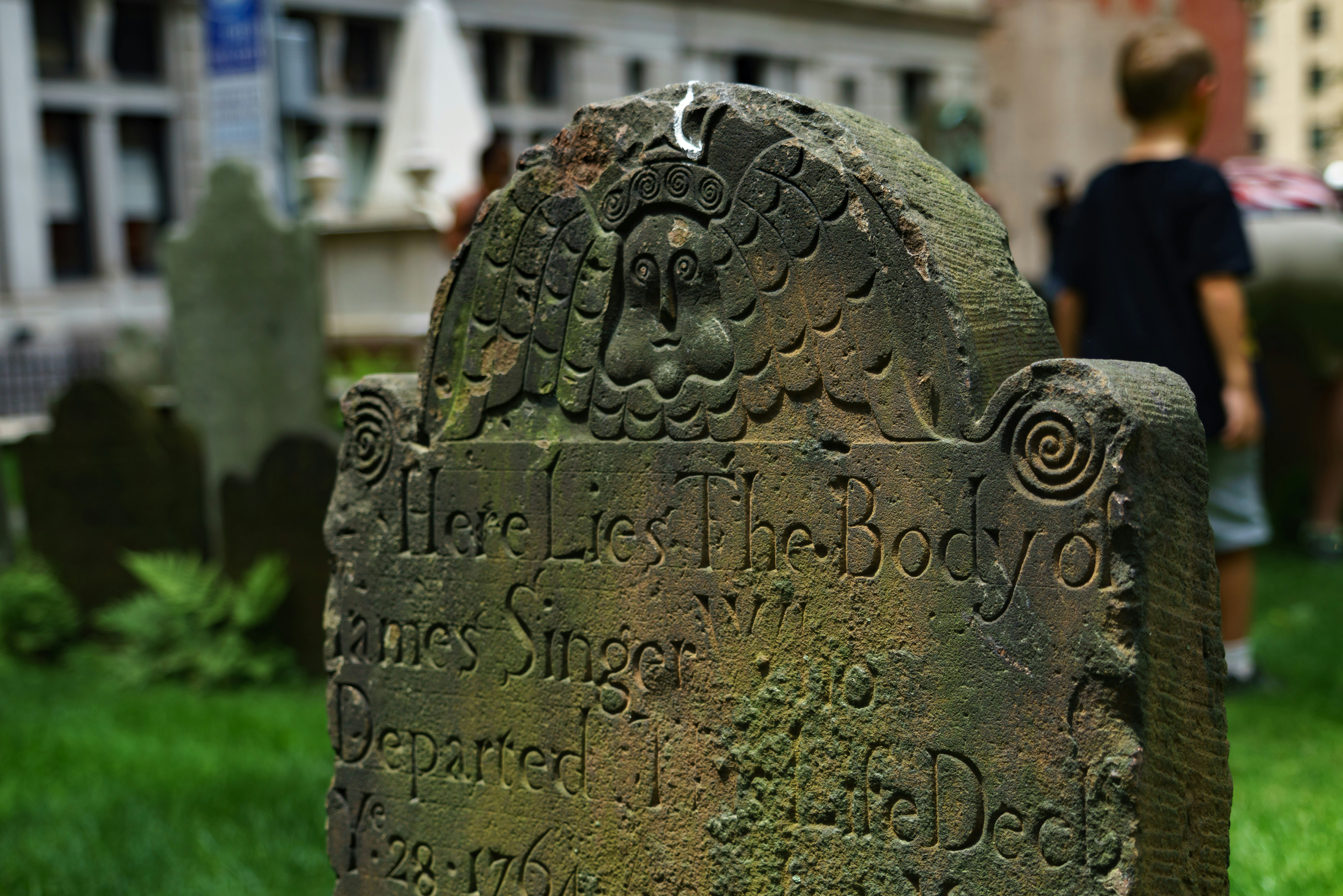 a stone with a carved face
