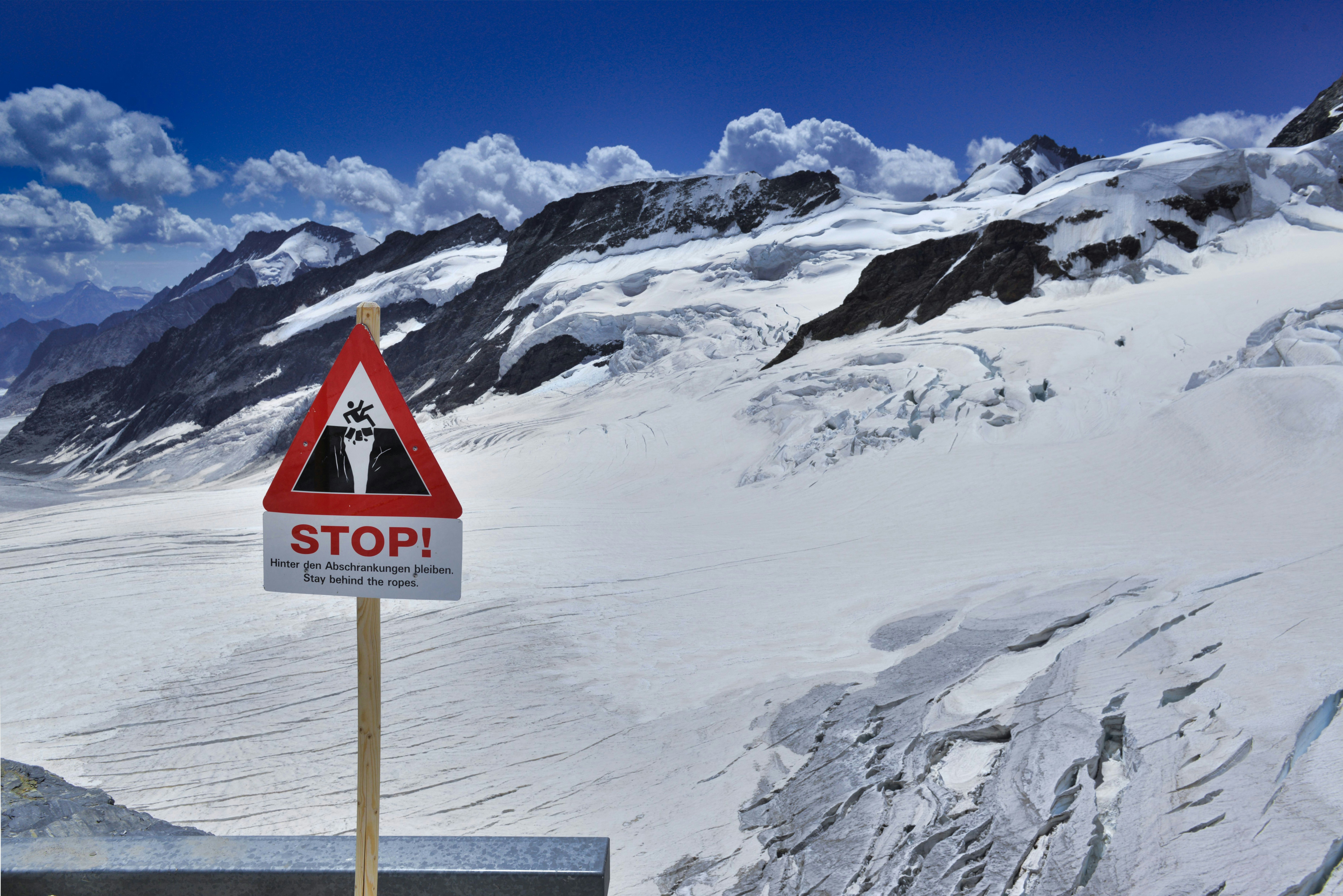 A sign on a snowy mountain photo – Free Jungfraujoch Image on Unsplash