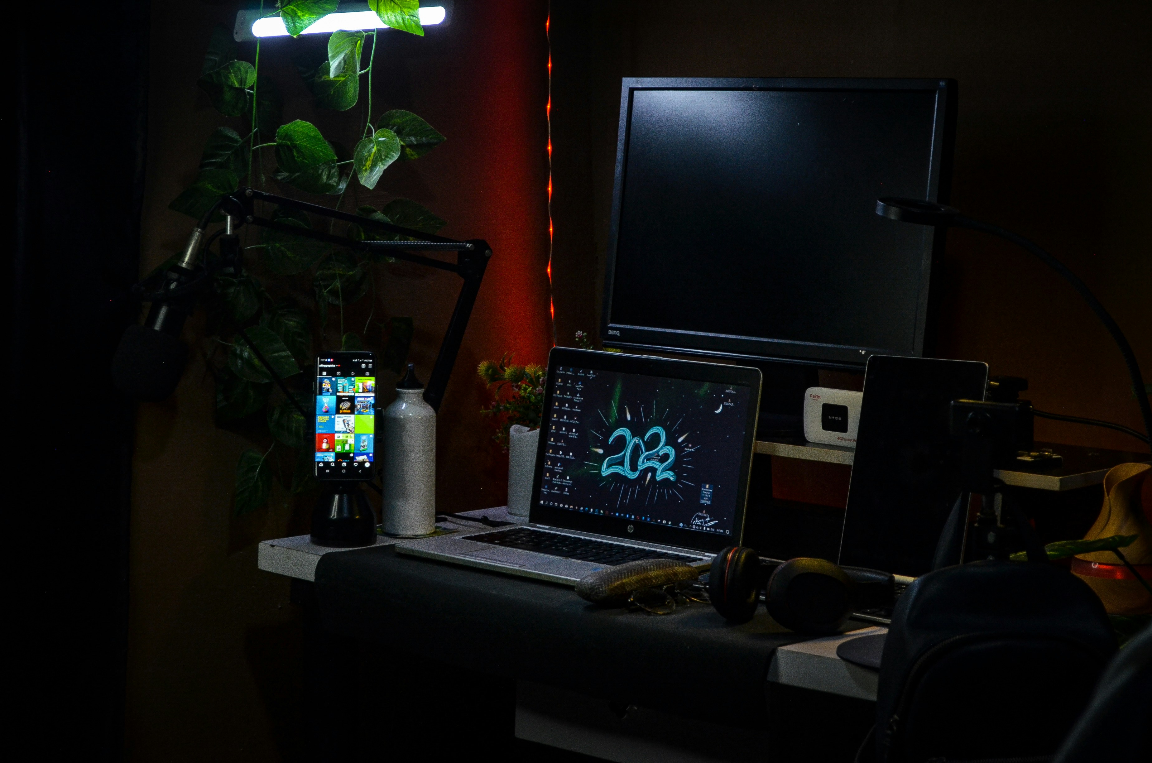 a laptop sits on a desk