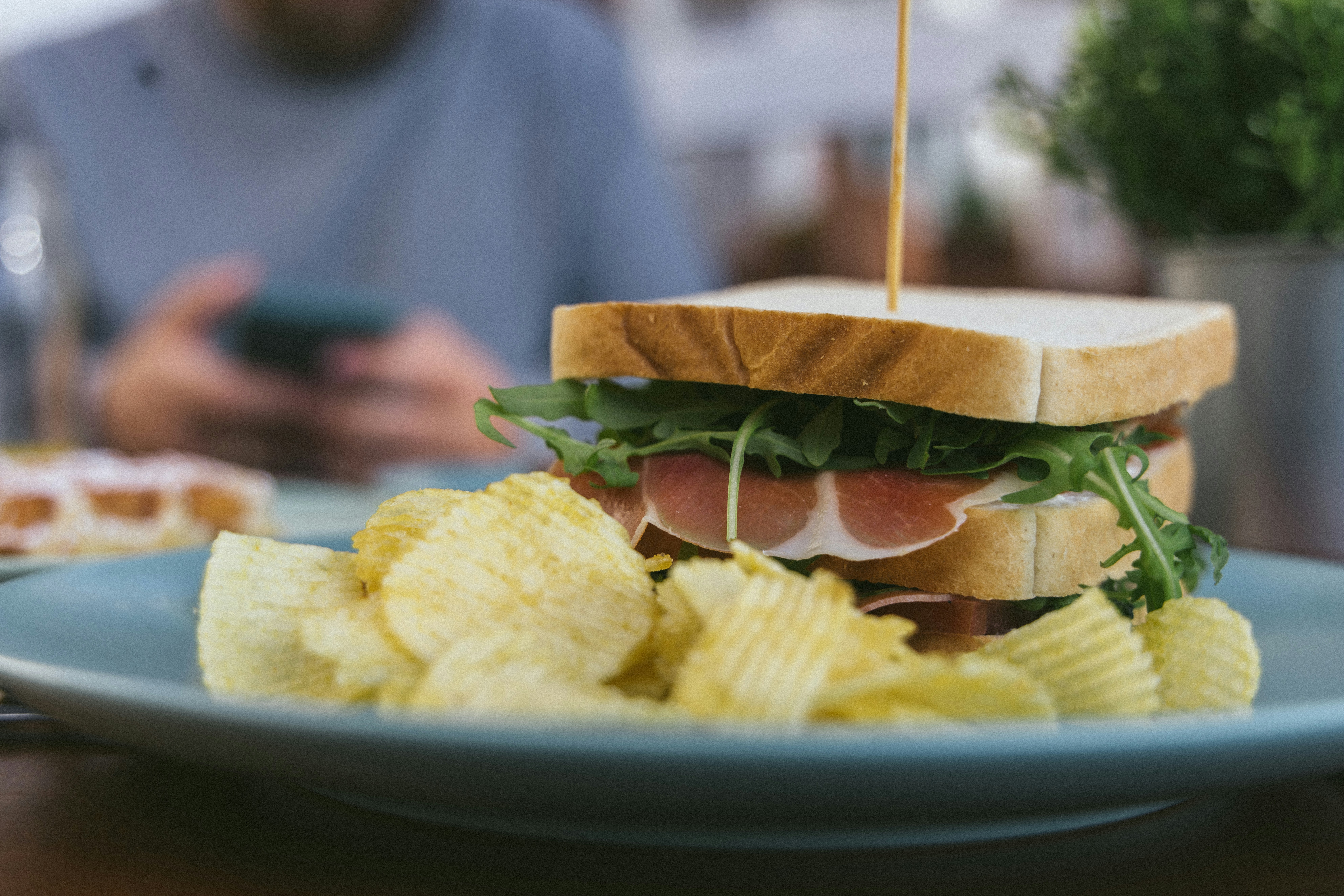 a sandwich with eggs and bacon