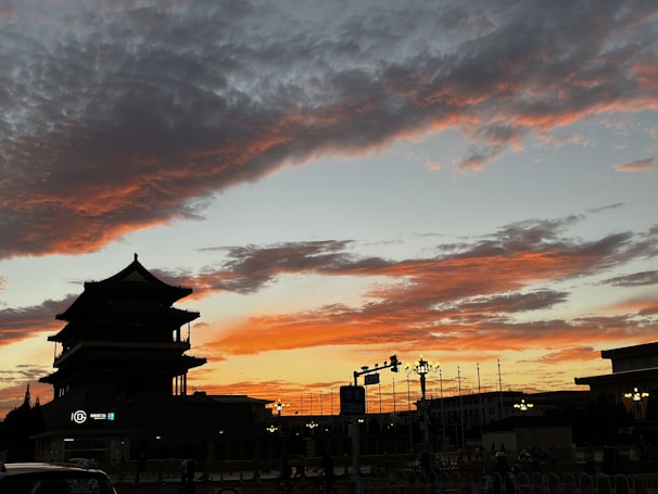 A beautiful sunset backdrop highlighting street art in Hanoi.