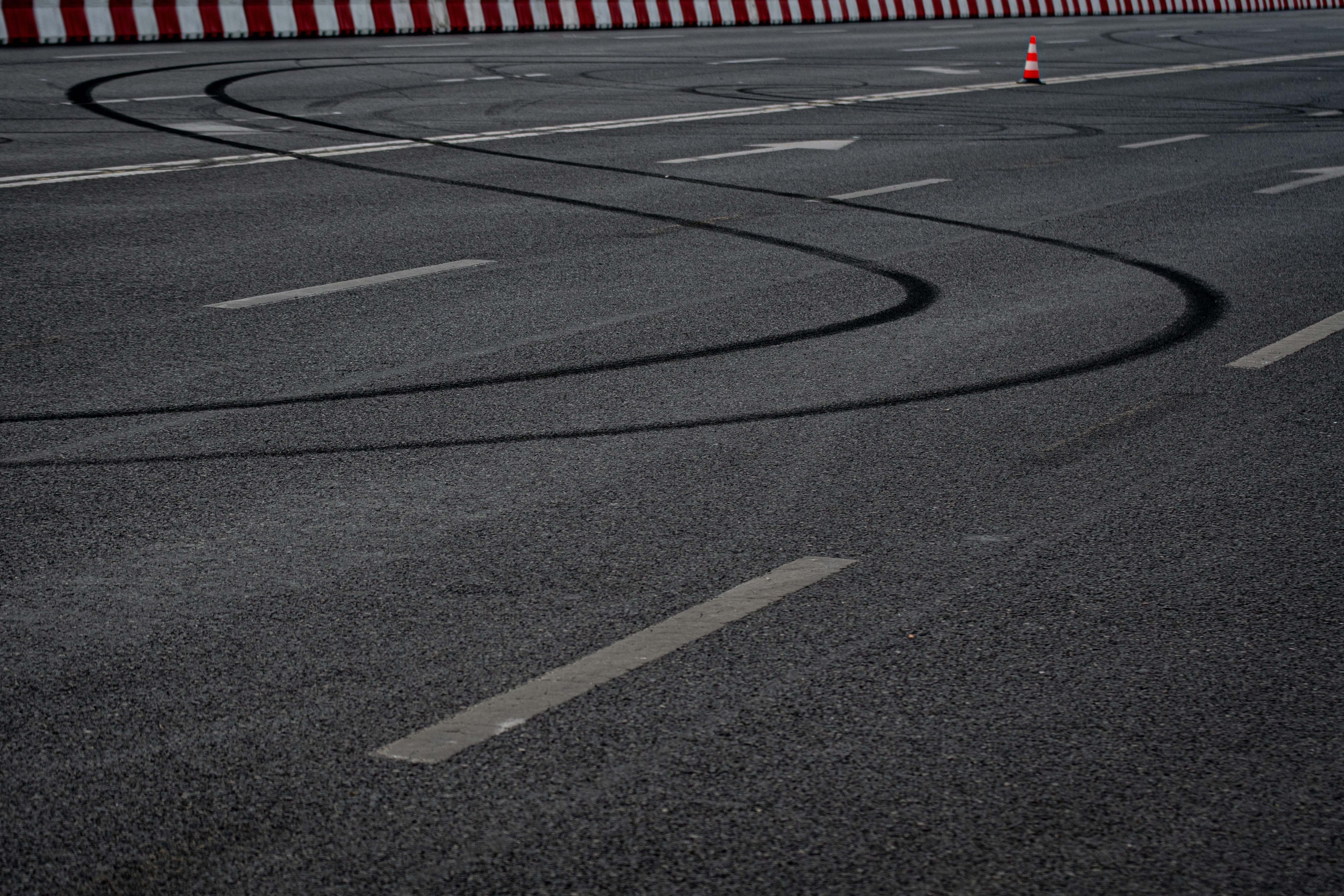 a road with a cone on the side