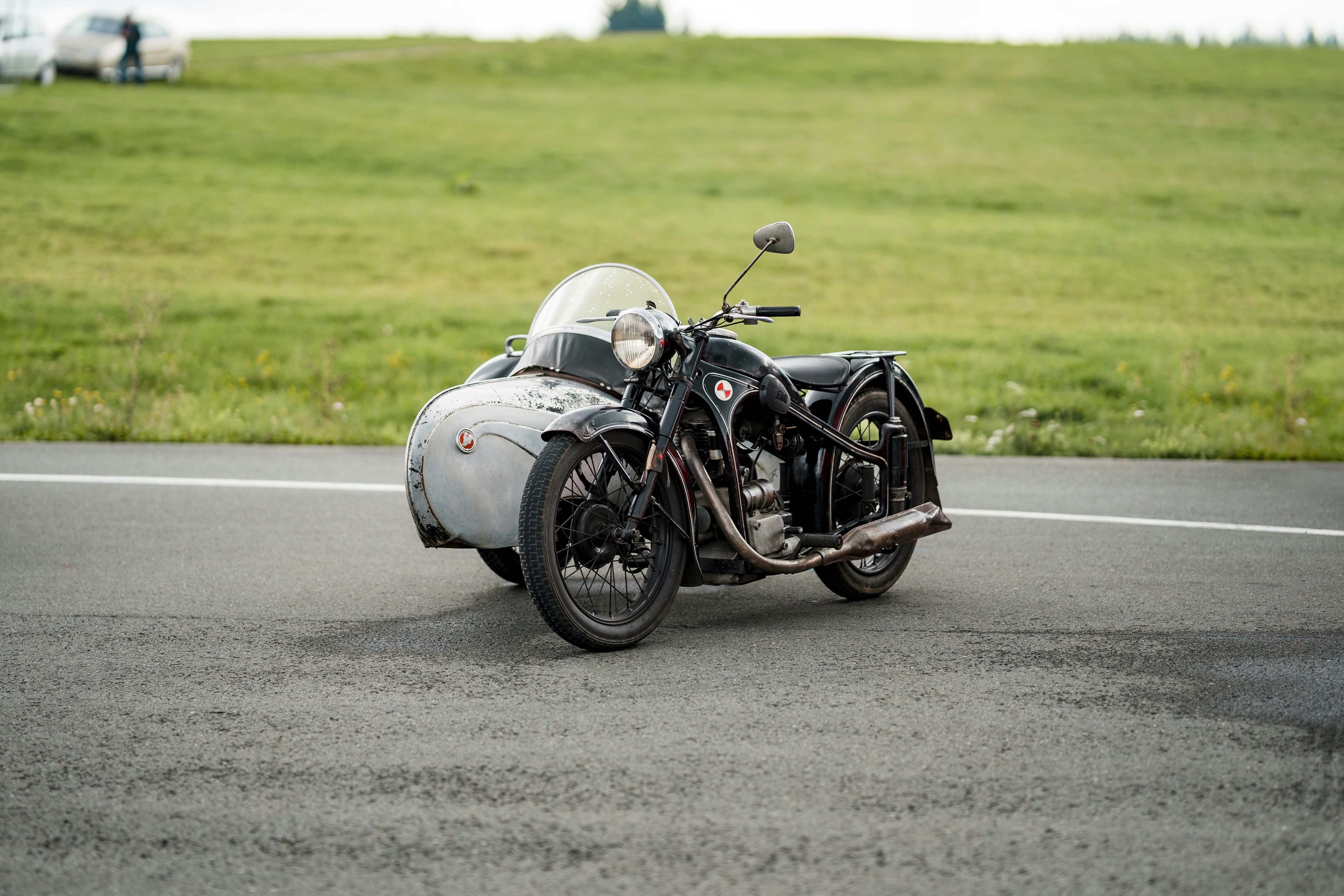a motorcycle parked on the side of a road