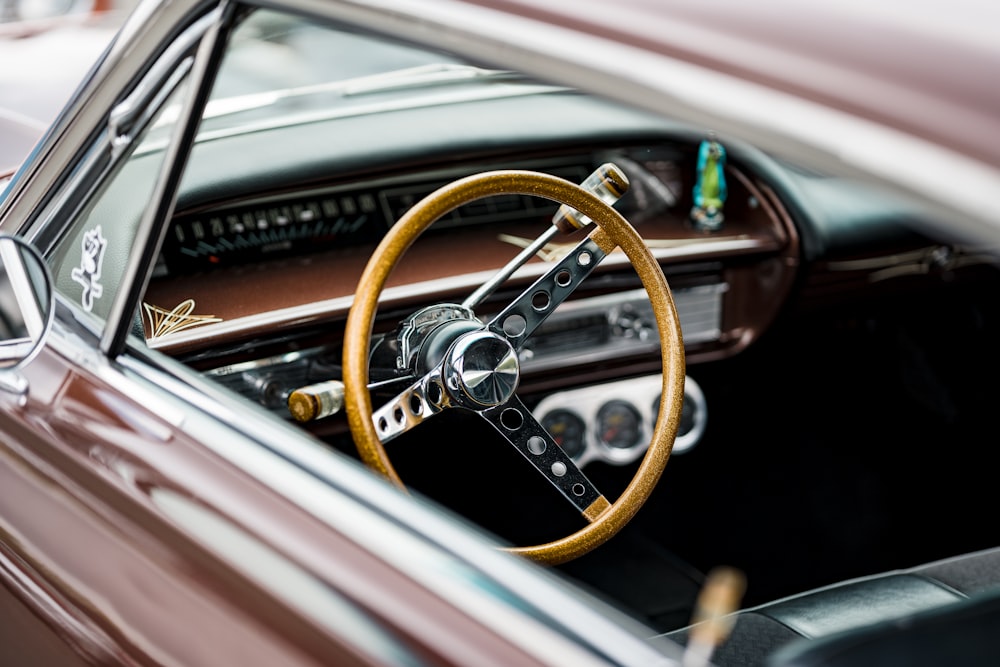 a steering wheel and dashboard of a car