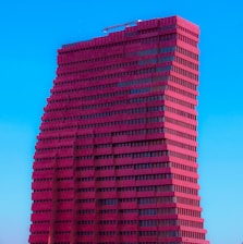 a tall building with a crane