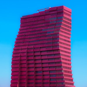 a tall building with a crane