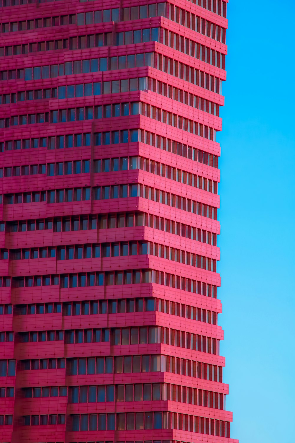 a tall red building