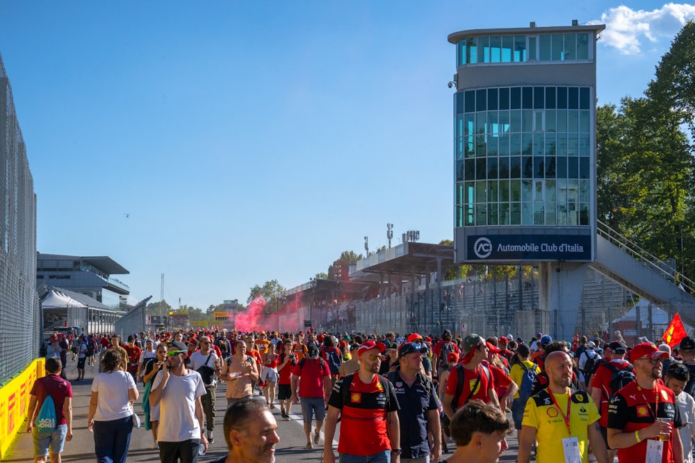 a crowd of people walking