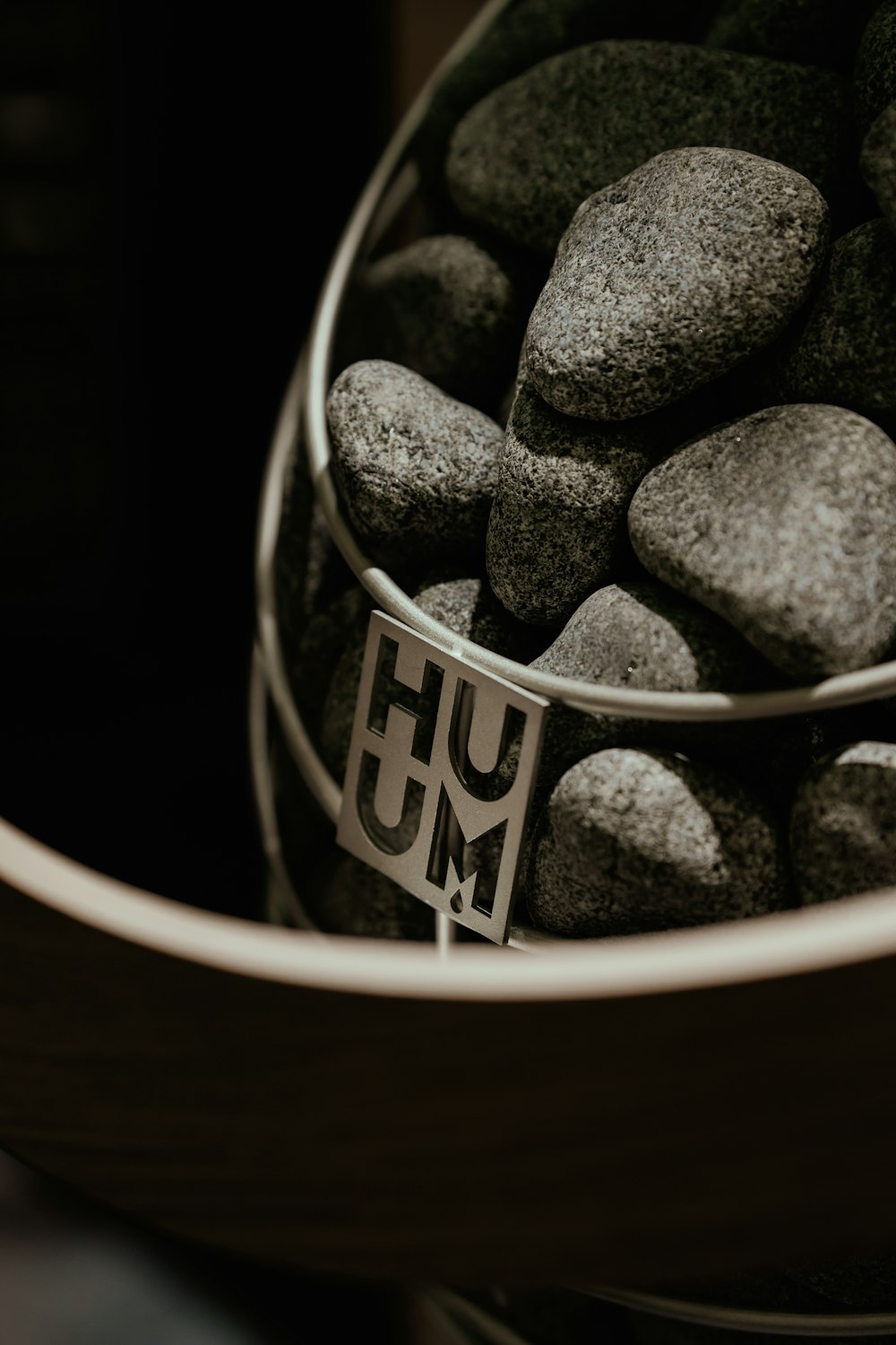 a glass jar with rocks in it