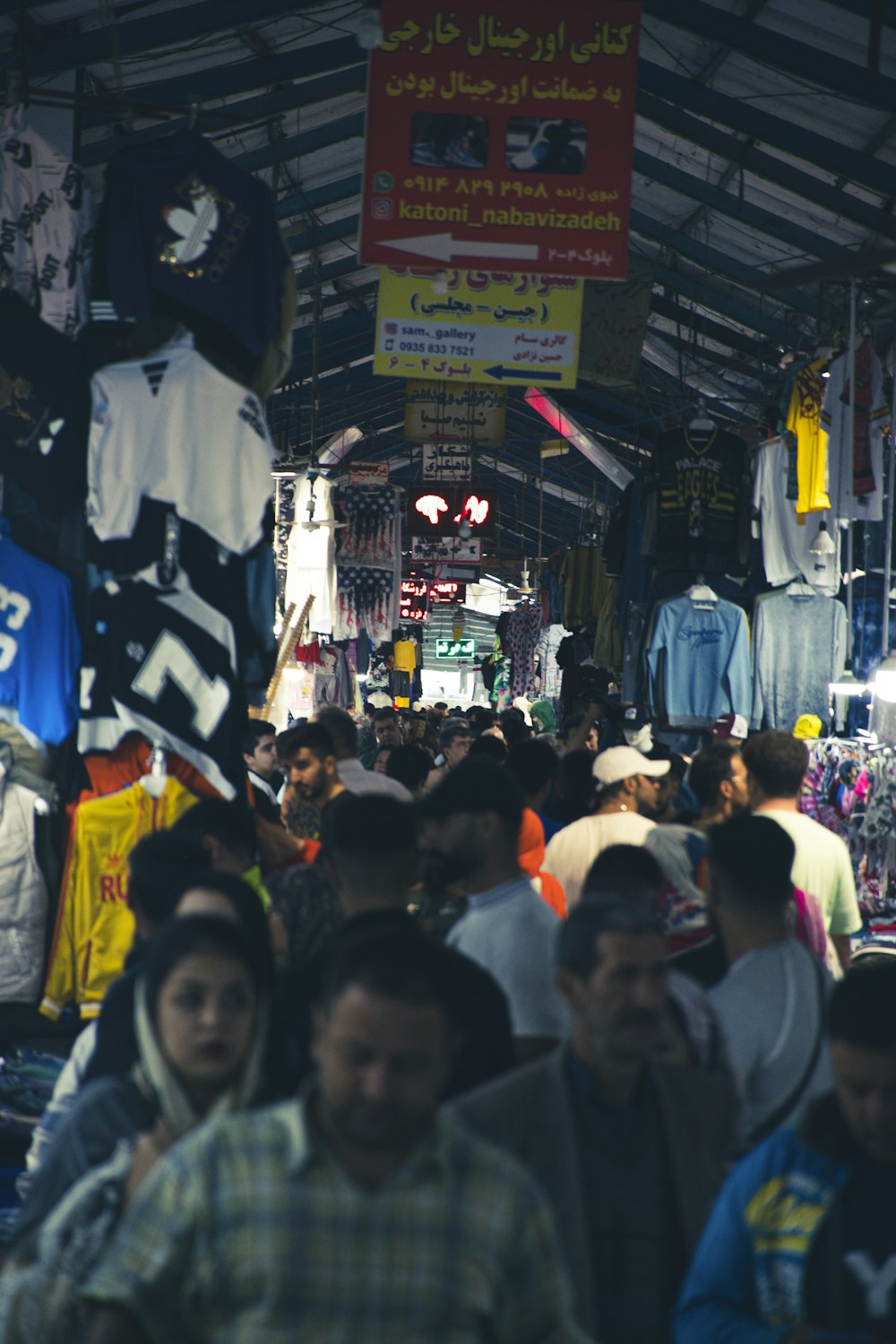 a crowd of people in a street