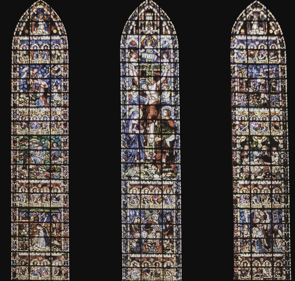 a group of stained glass windows