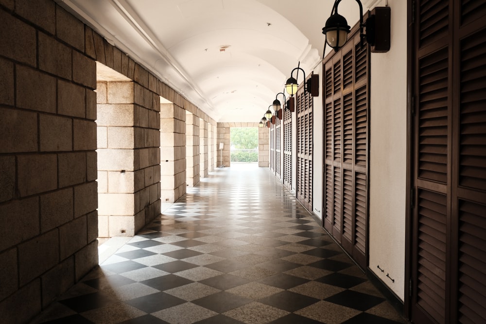 a hallway with brick walls