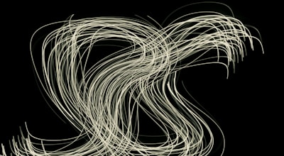 Abstract visualization of quantum entanglement represented by intertwined light strands.