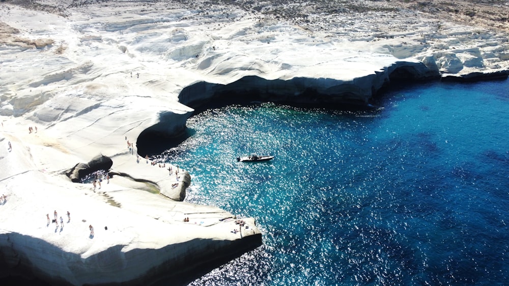 a group of people on icebergs