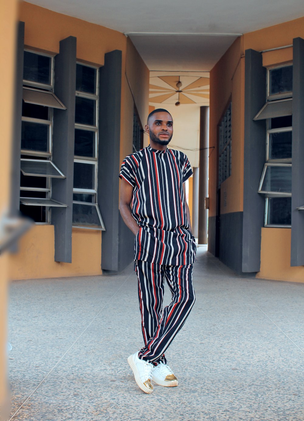 a man wearing a striped shirt