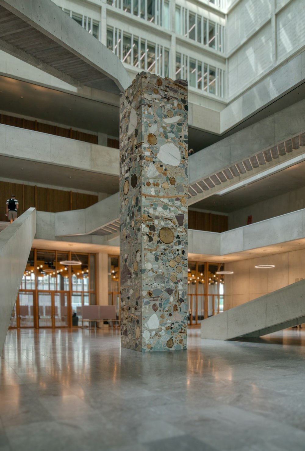 a tall stone pillar in a building