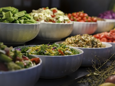 a group of bowls full of food