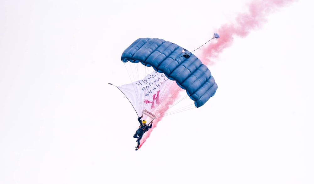a person in a parachute