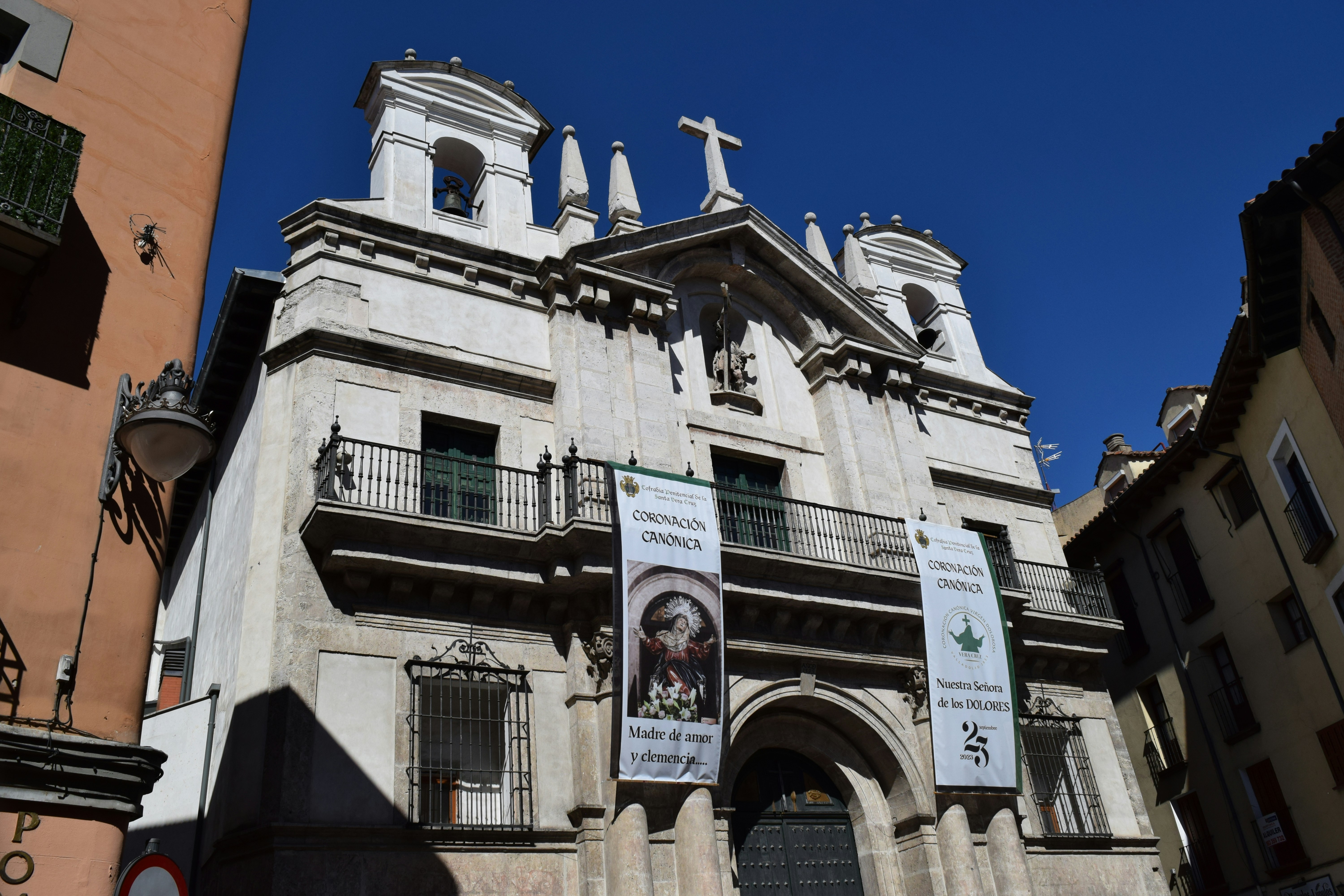 a building with a statue on top