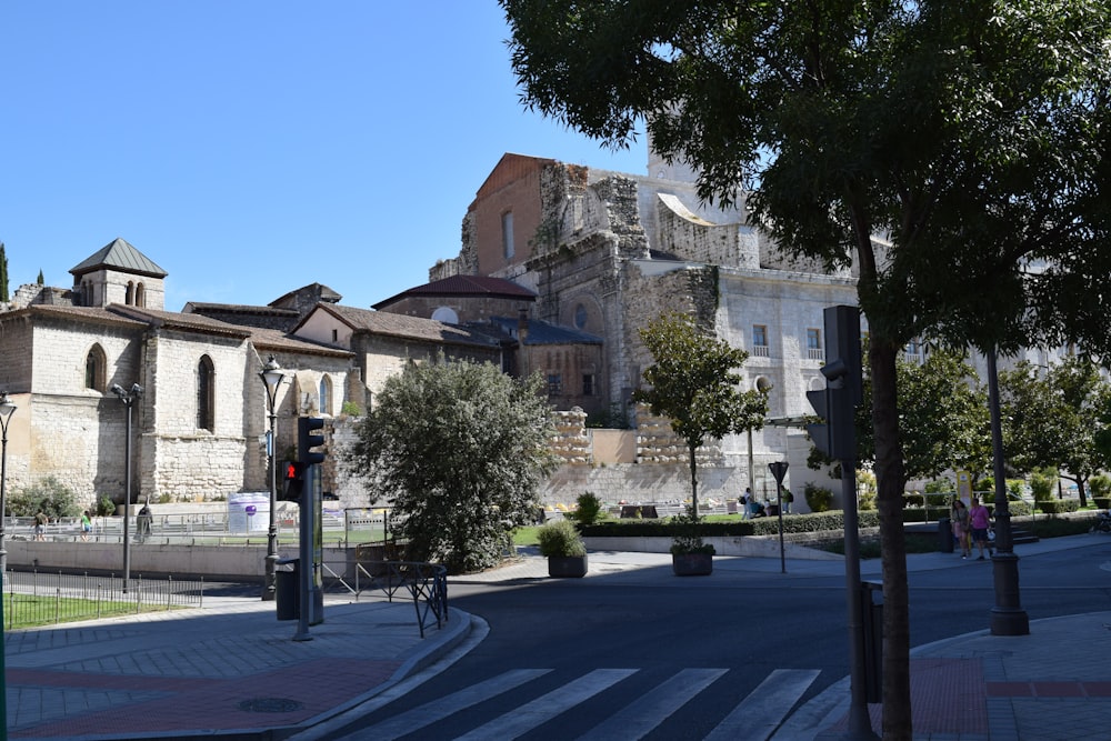 a large building with trees in front of it