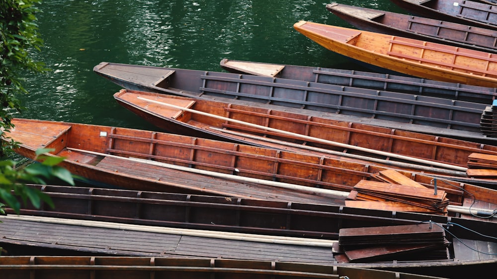 a row of boats on a dock