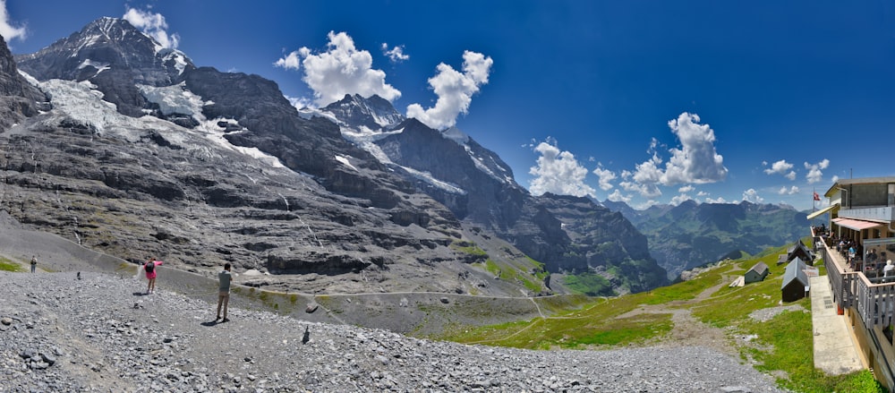 people walking on a rocky path