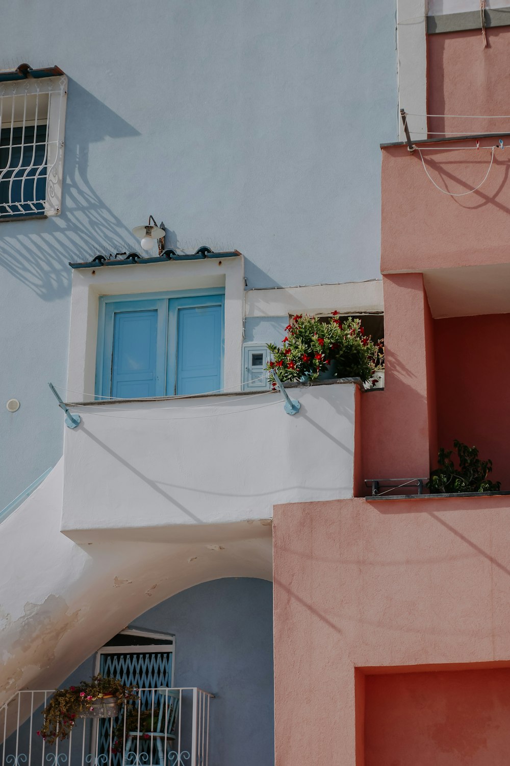 a white building with blue windows